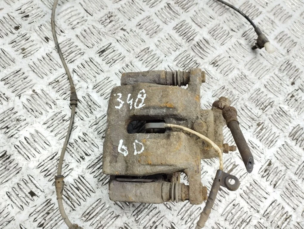 Rear brake caliper – right