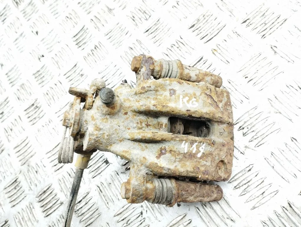 Rear brake caliper – left