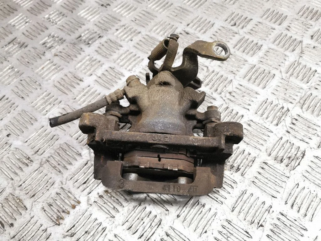 Rear brake caliper – right