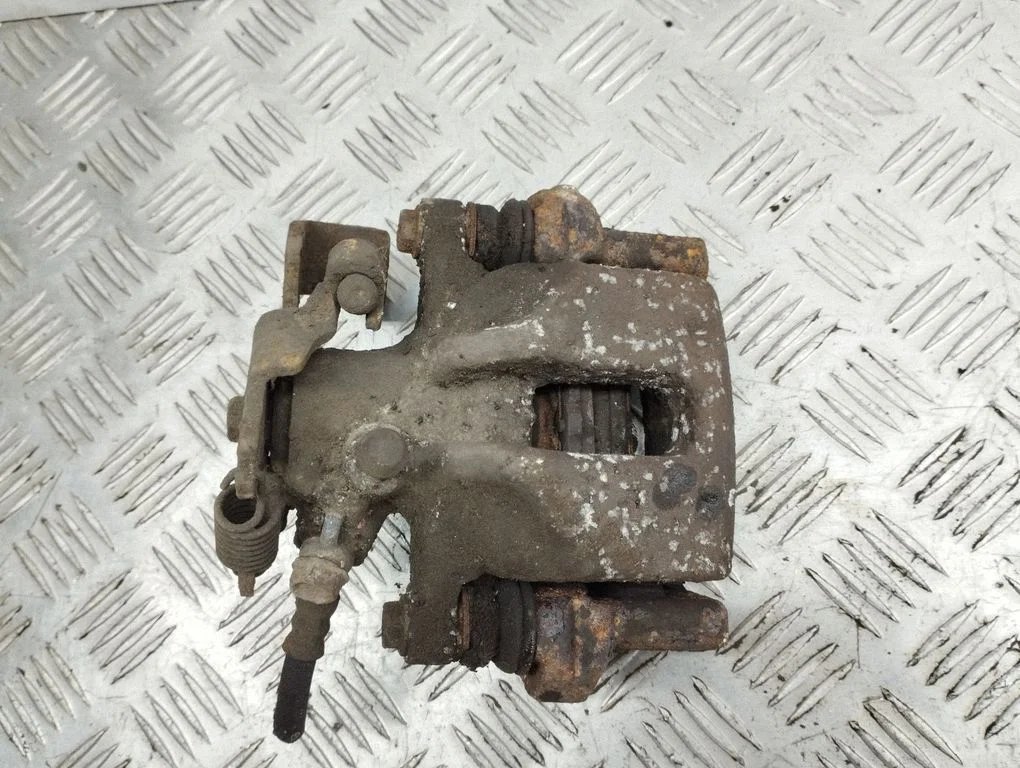 Rear brake caliper – rear left