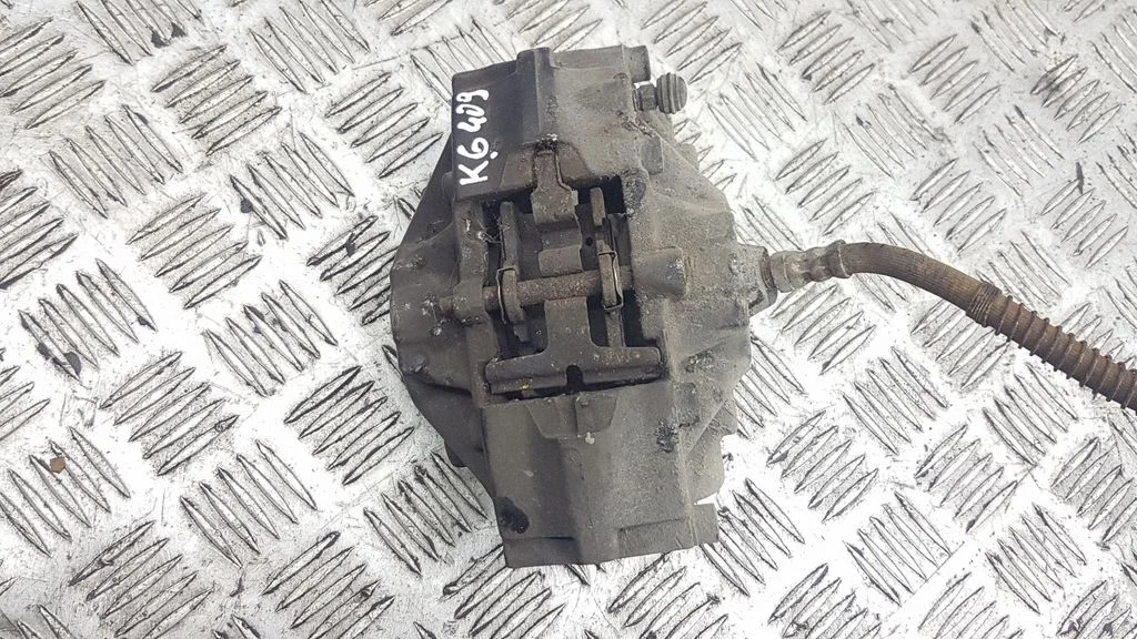 Rear brake caliper – left