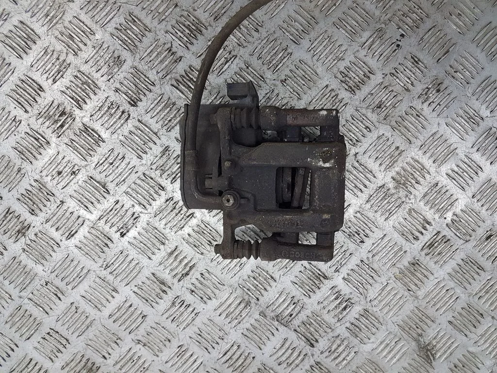 Rear brake caliper AD777015