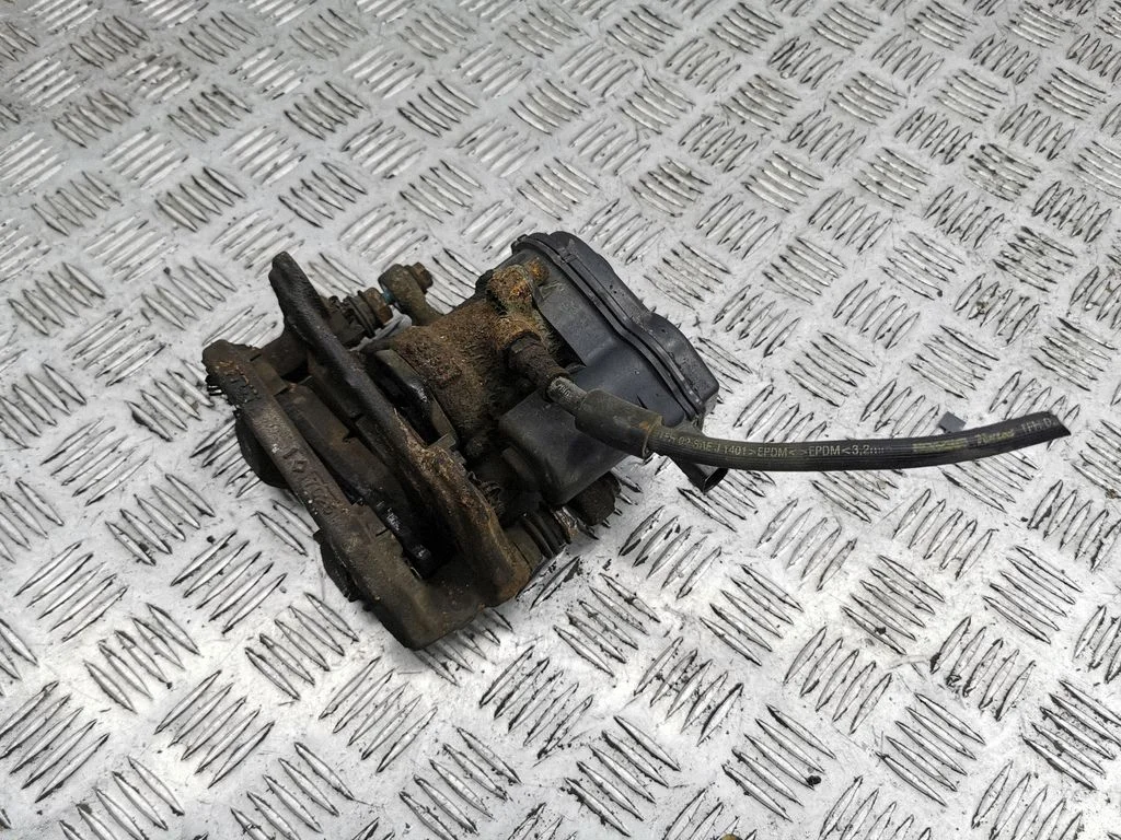Rear brake caliper – right