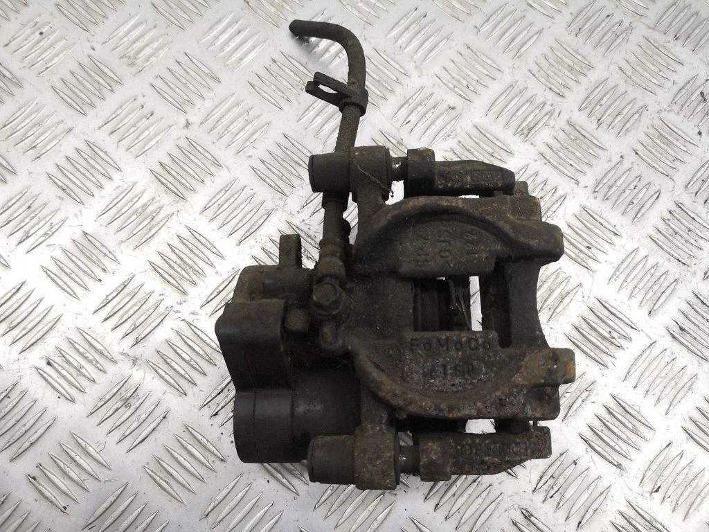 Rear brake caliper – right