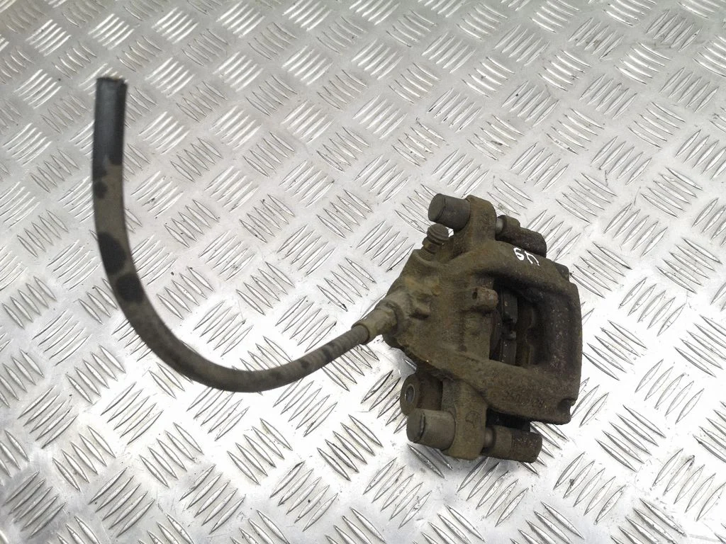Rear brake caliper – right