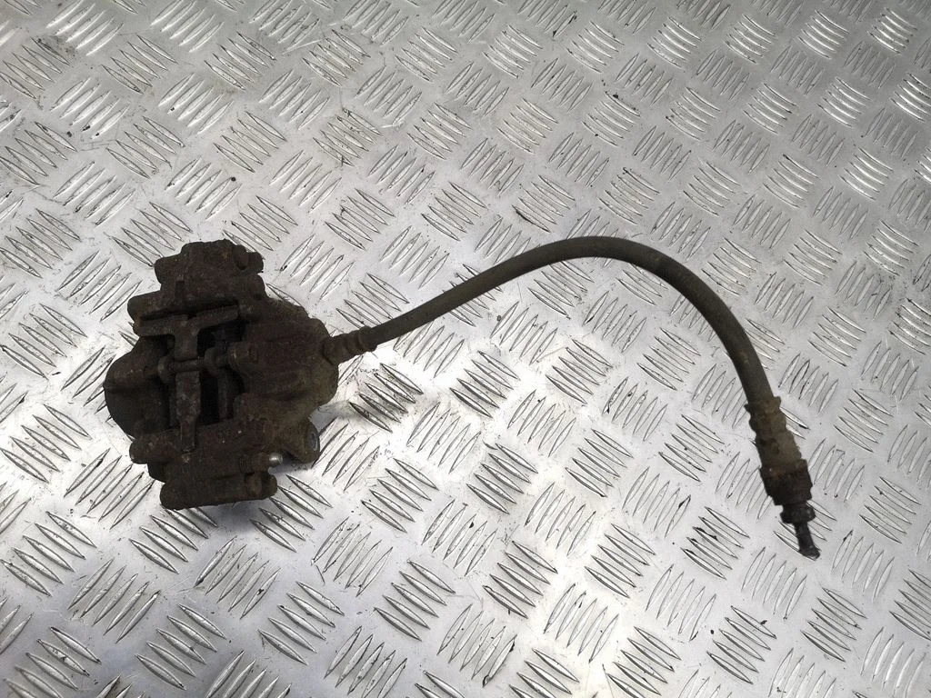 Rear brake caliper – right