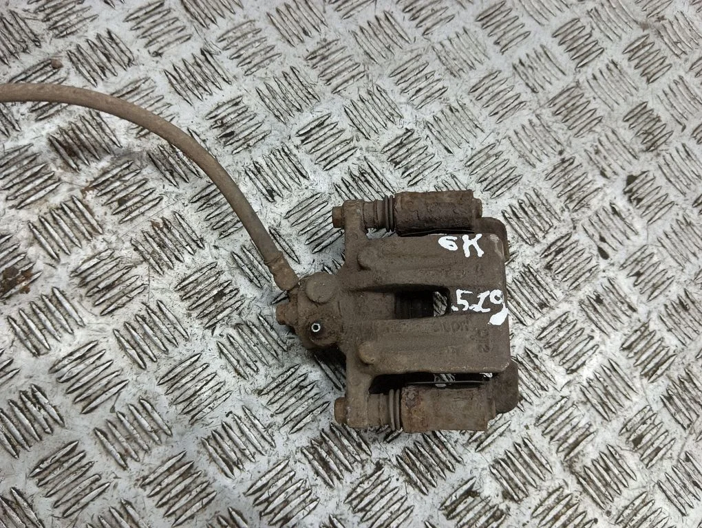 Rear brake caliper – rear left