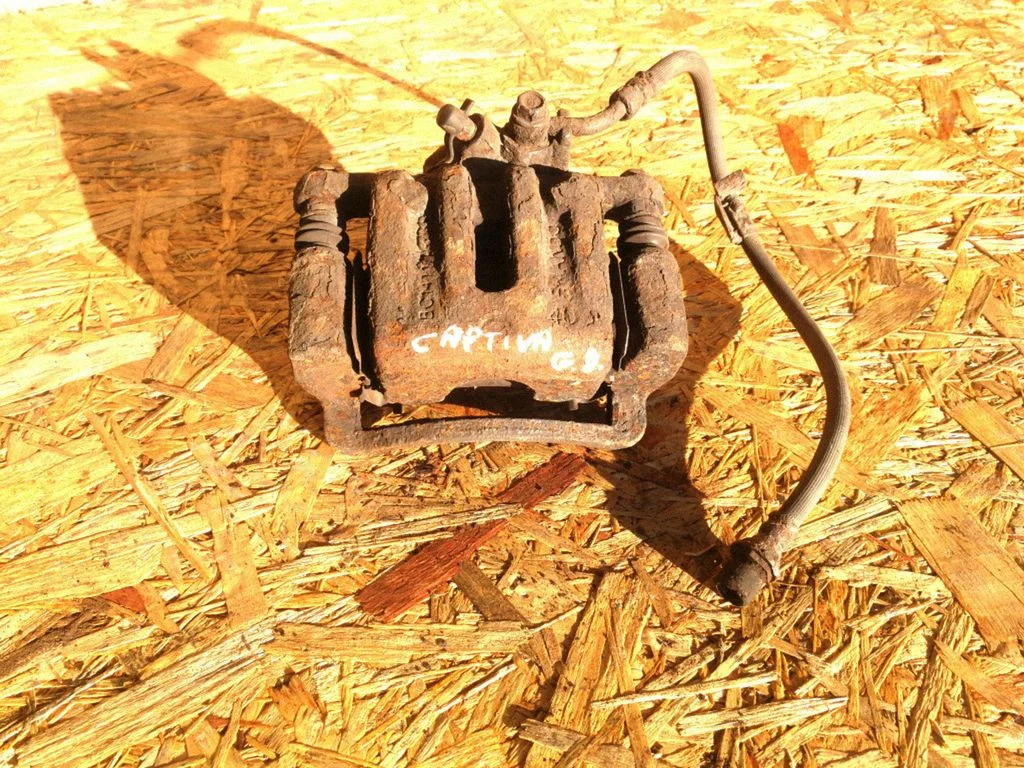 Rear brake caliper – right