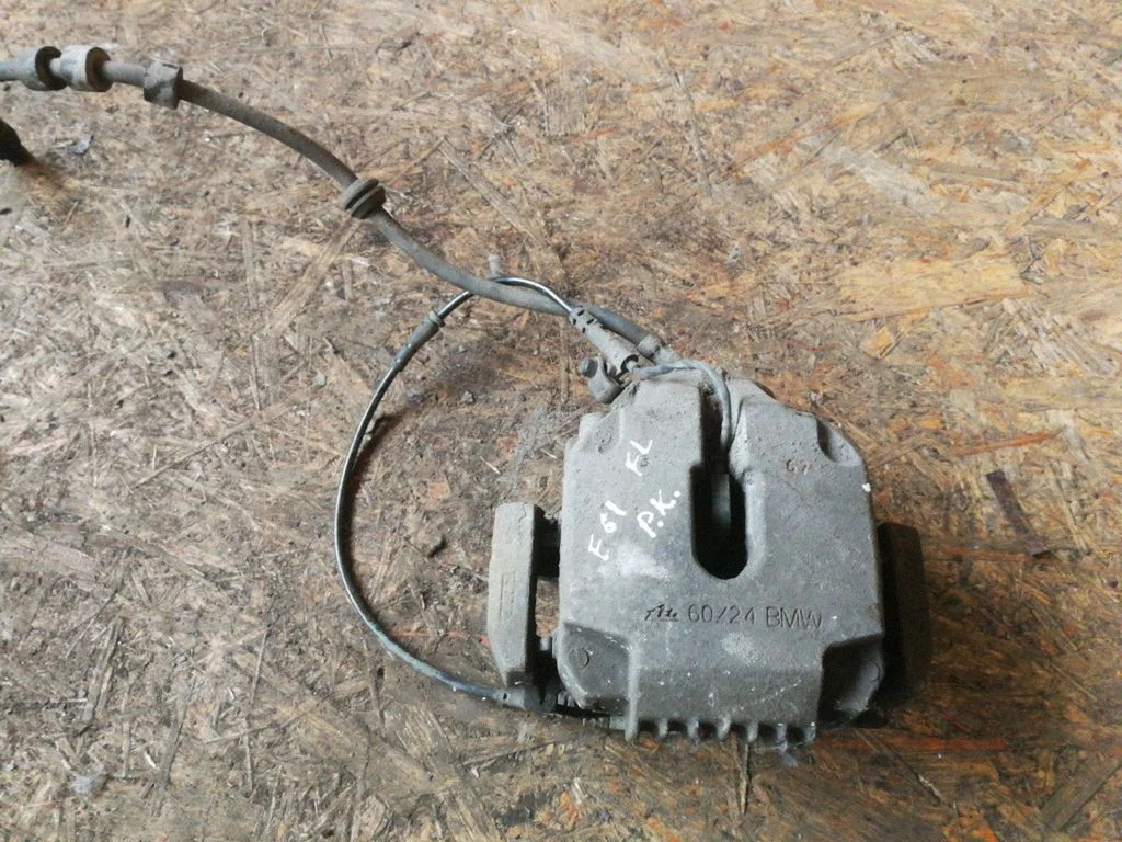Rear brake caliper – left