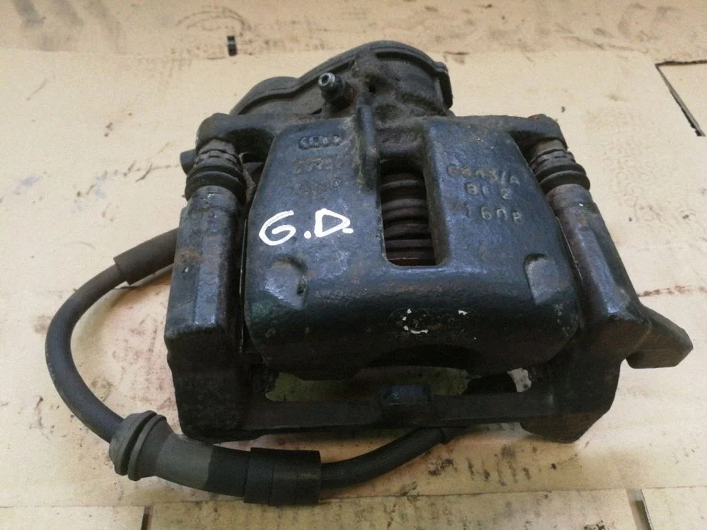Rear brake caliper – right