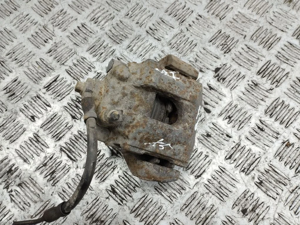 Rear brake caliper – rear left