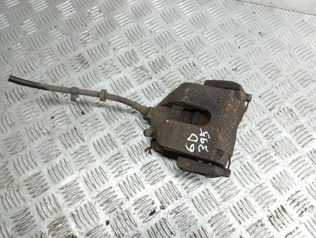 Rear brake caliper – right