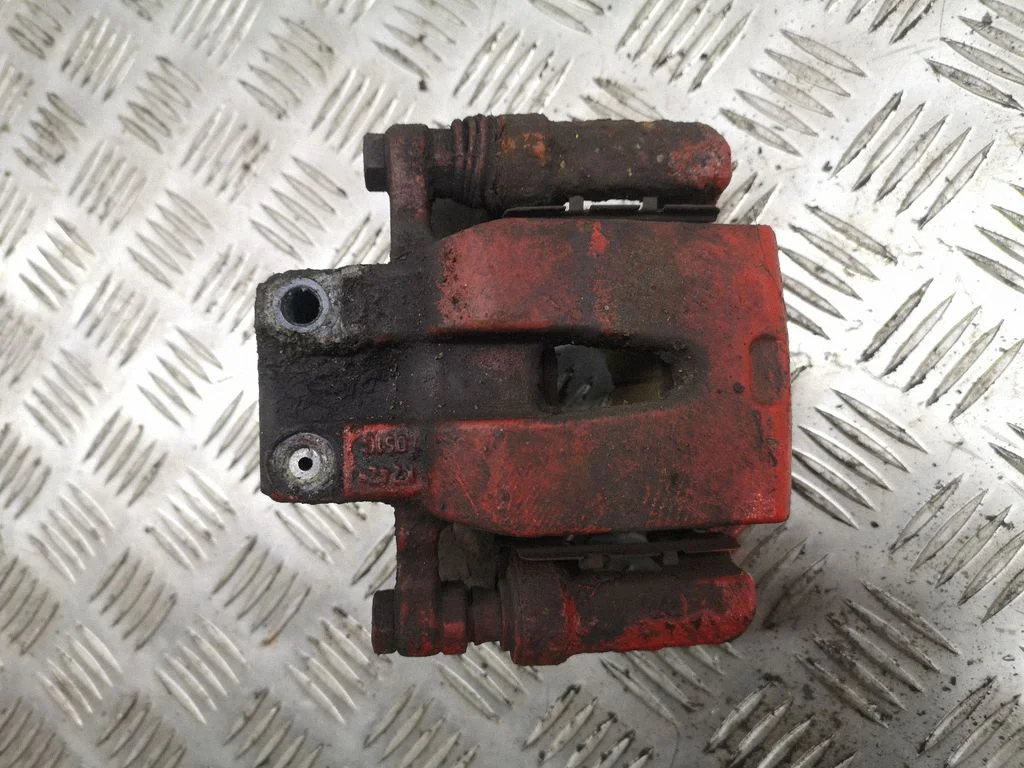 Rear brake caliper – right