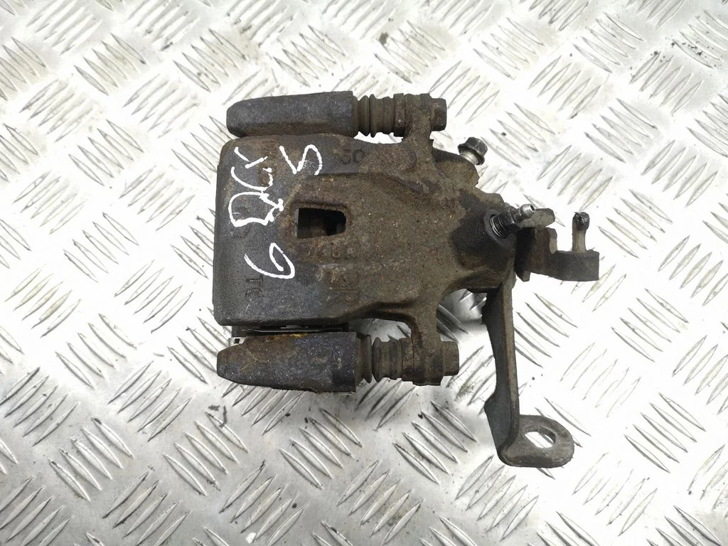 Rear brake caliper – right