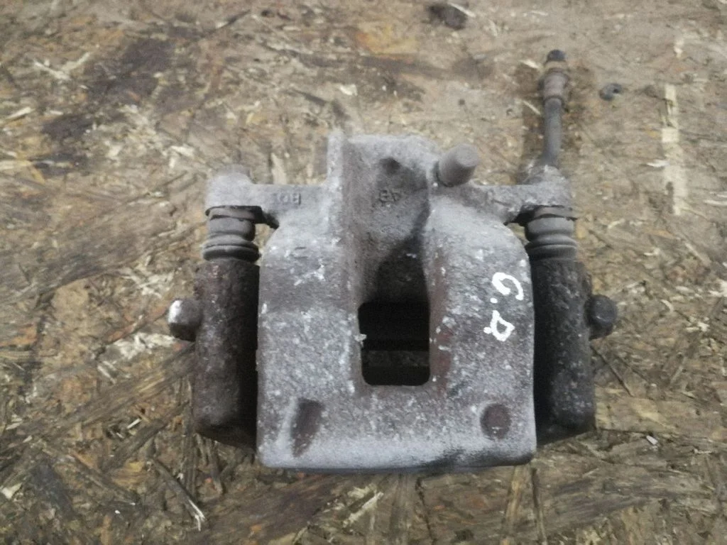 Rear brake caliper – right