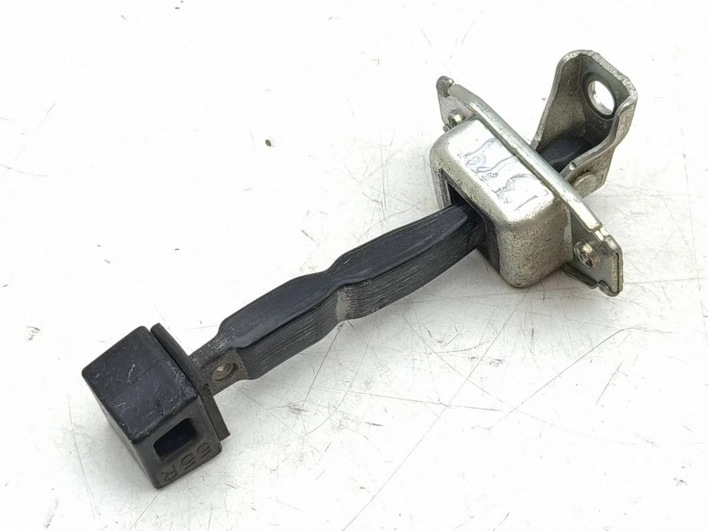 Front door check strap stopper – right