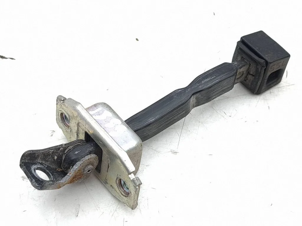 Front door check strap stopper – left