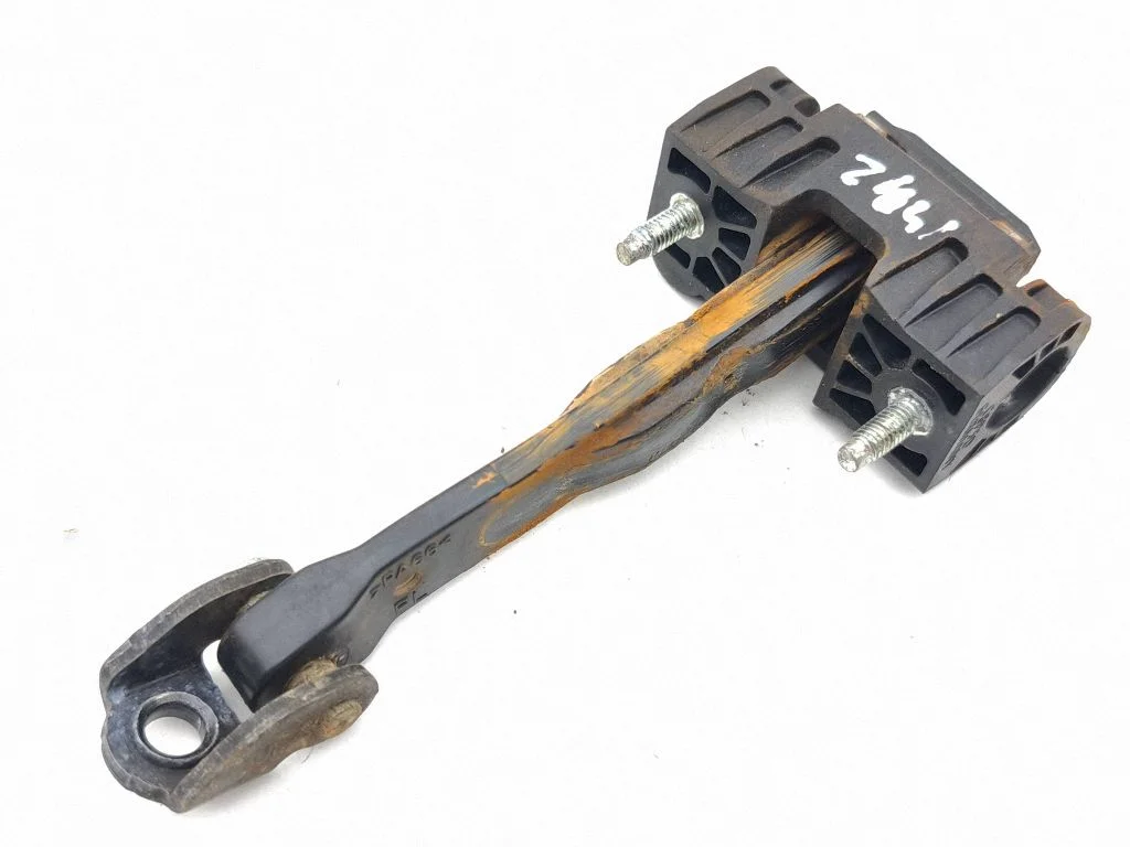 Front door check strap stopper – right
