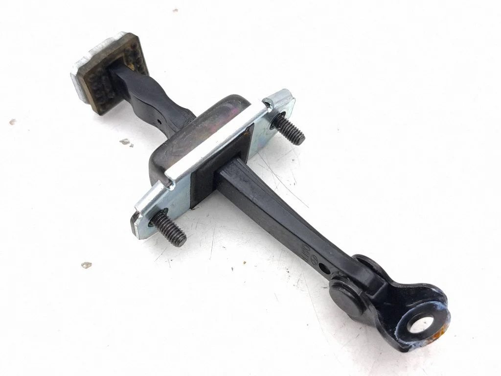 Front door check strap stopper – right