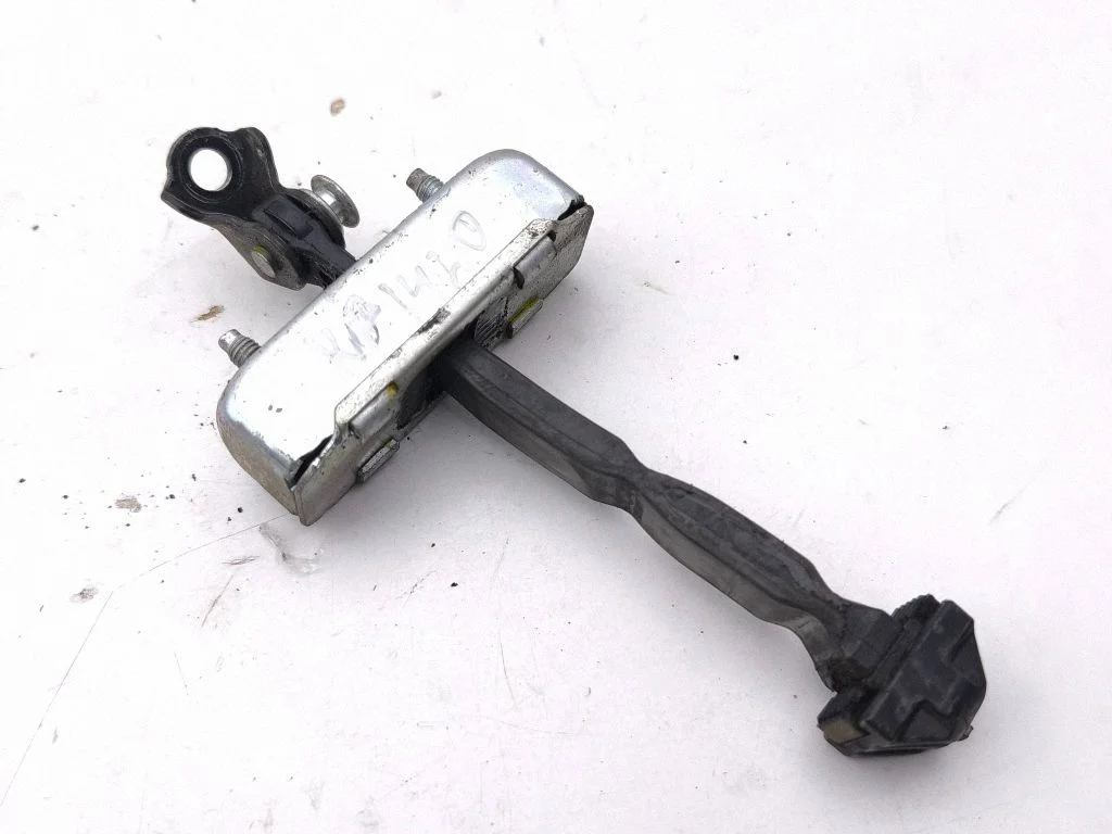 Front door check strap stopper – left