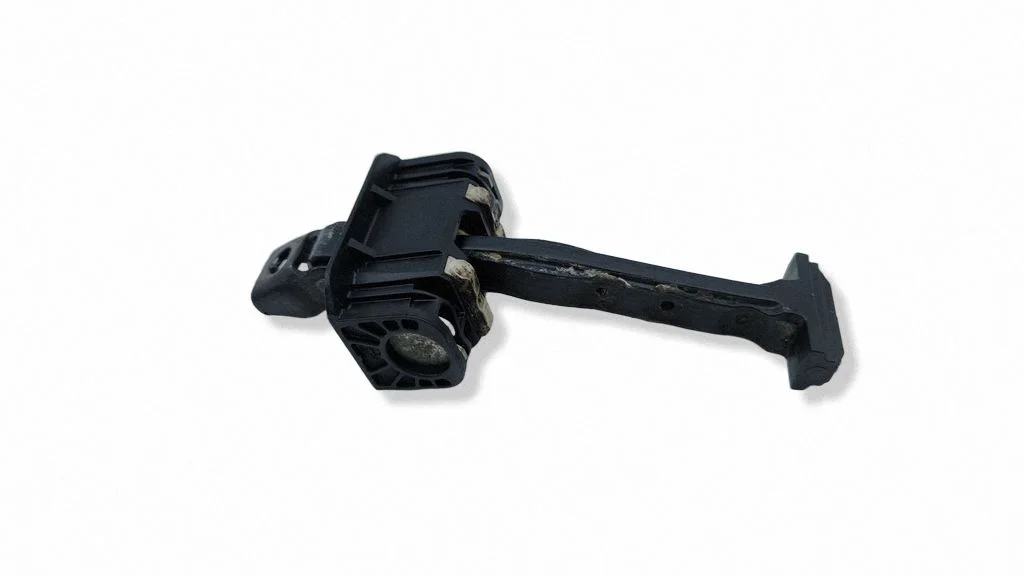Front door check strap stopper – right