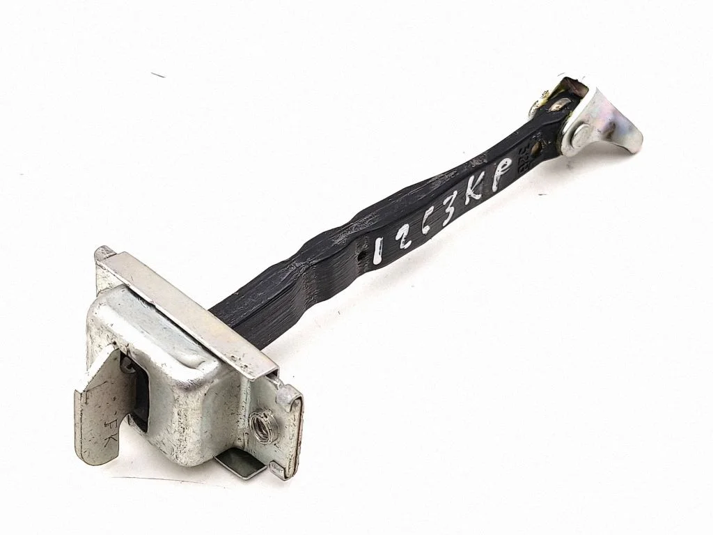 Front door check strap stopper – left
