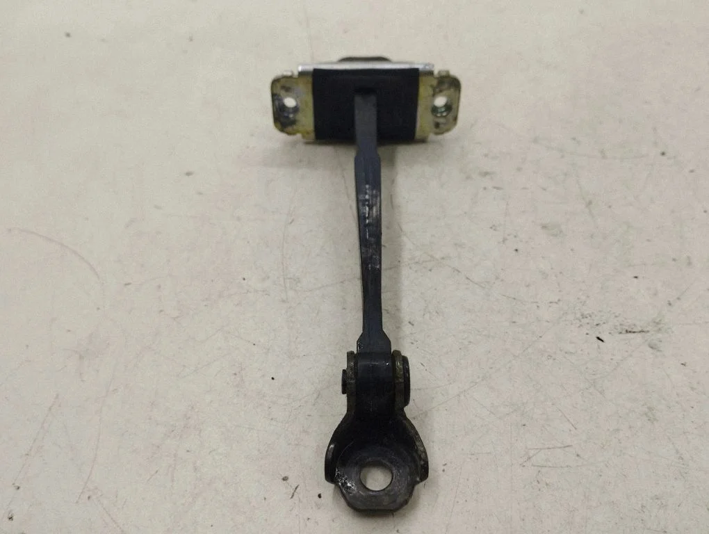 Front door check strap stopper – right