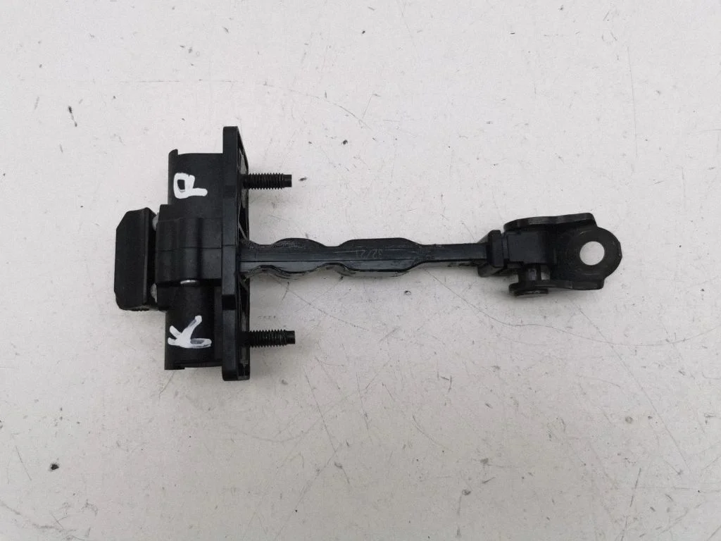 Front door check strap stopper – left