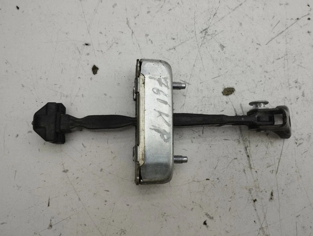 Front door check strap stopper – left