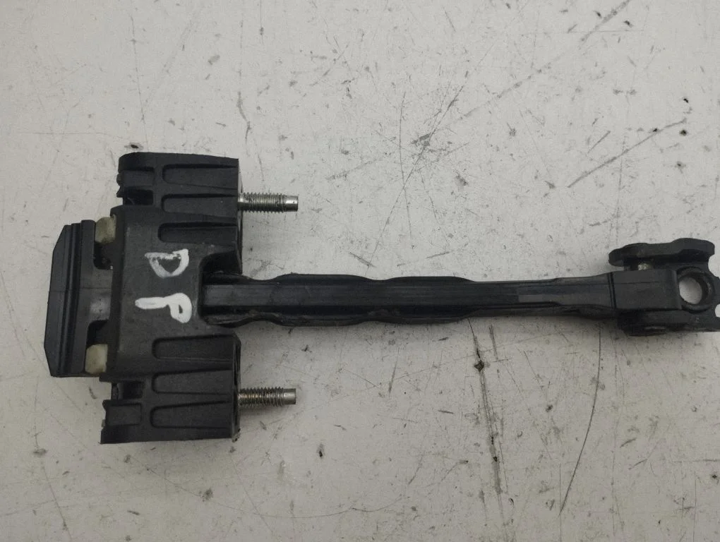 Front door check strap stopper – right