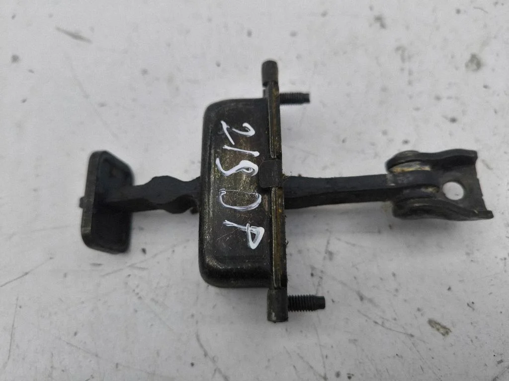Front door check strap stopper – right