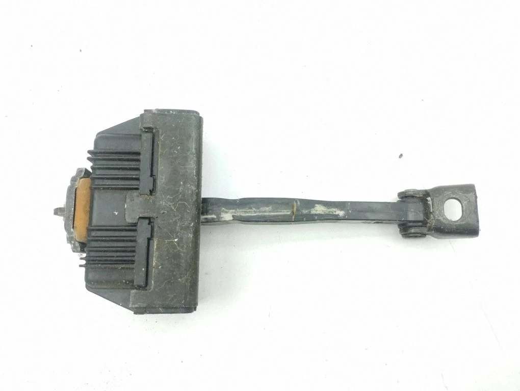Front door check strap stopper – left