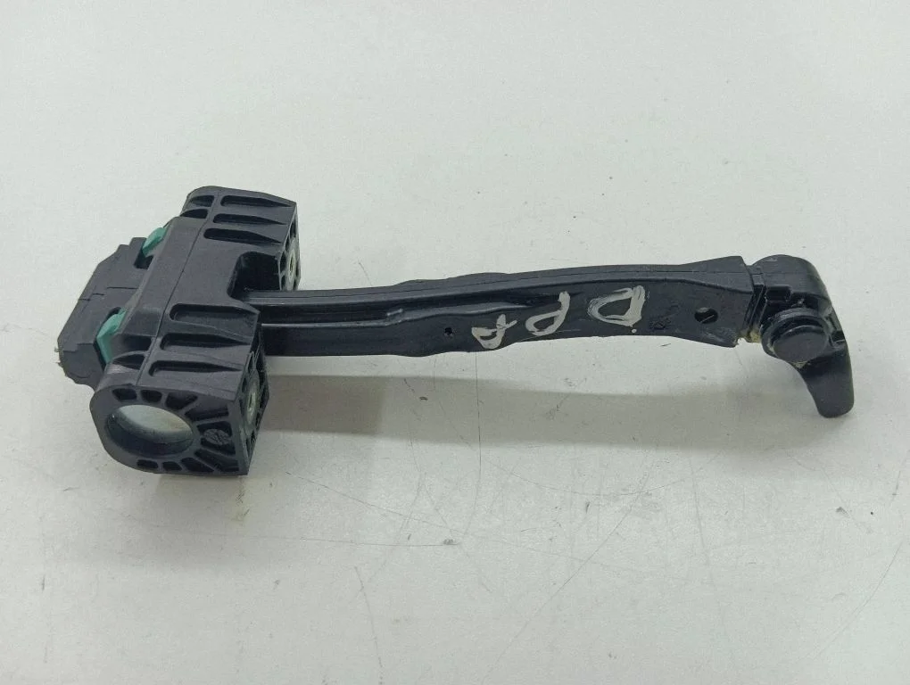 Front door check strap stopper – right
