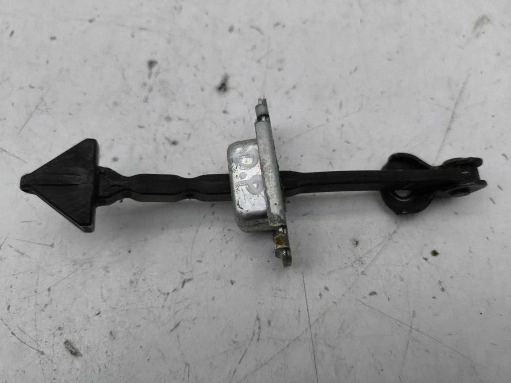 Front door check strap stopper – right