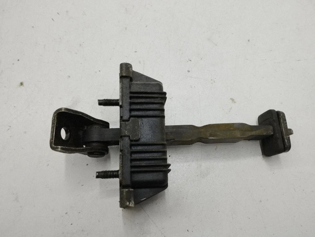 Front door check strap stopper – right