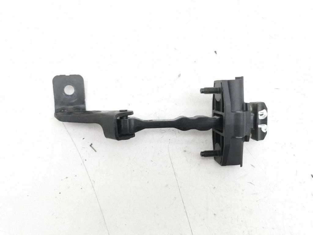 Front door check strap stopper – right