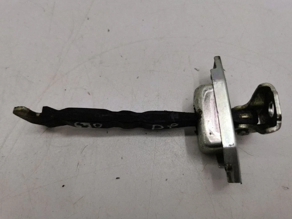 Front door check strap stopper – right