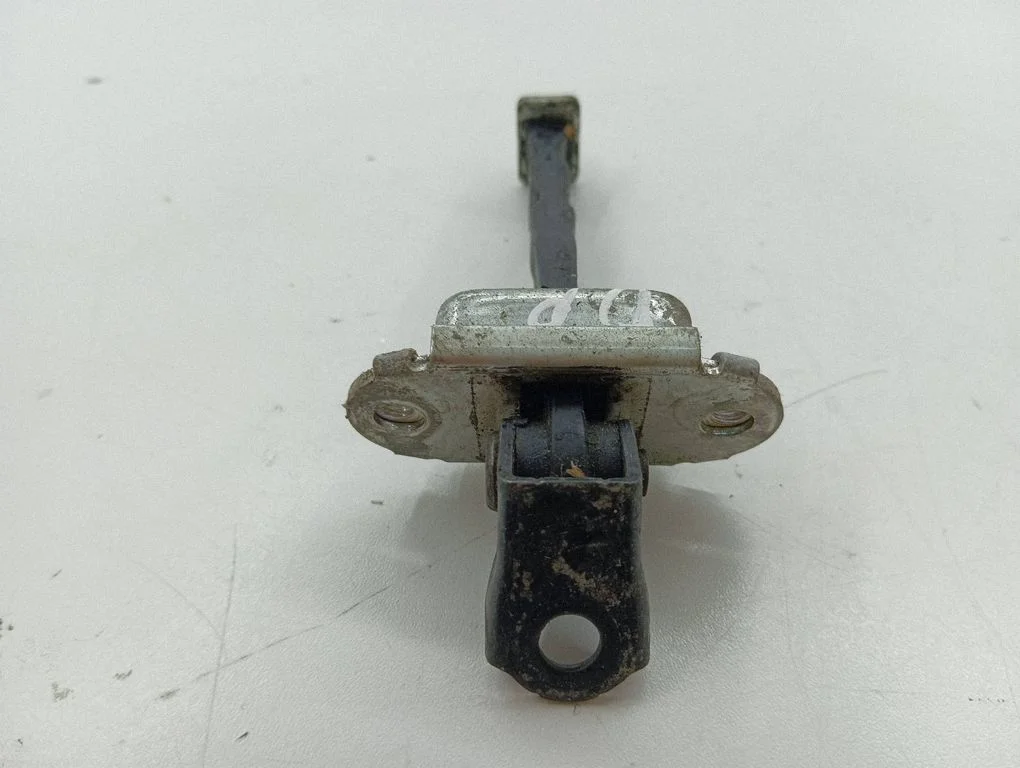 Front door check strap stopper – right