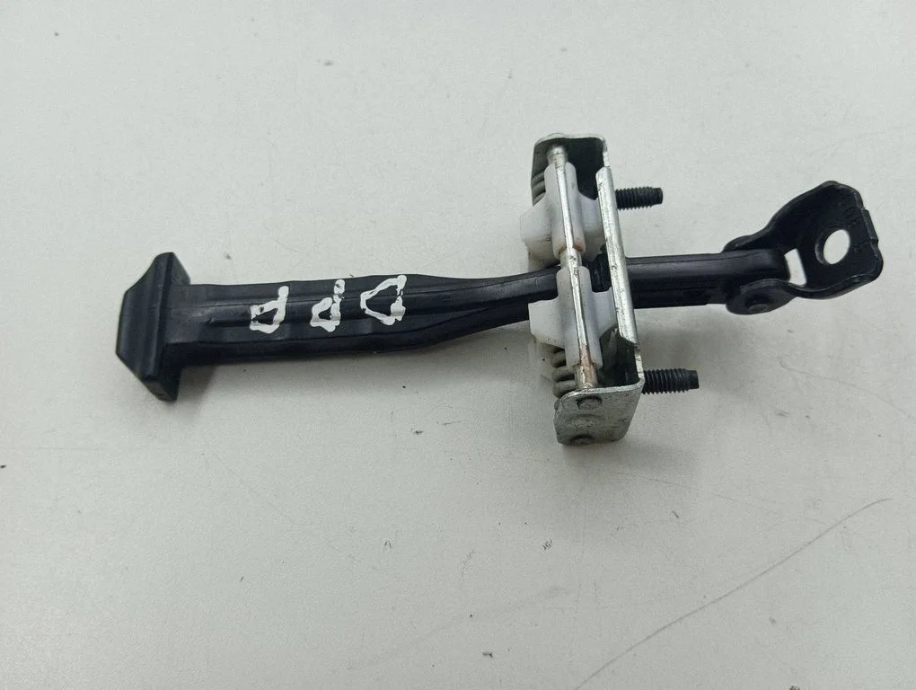 Front door check strap stopper – right