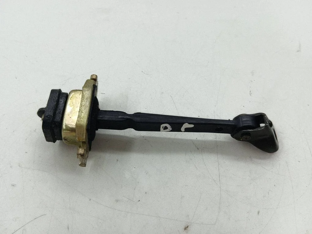 Front door check strap stopper – right