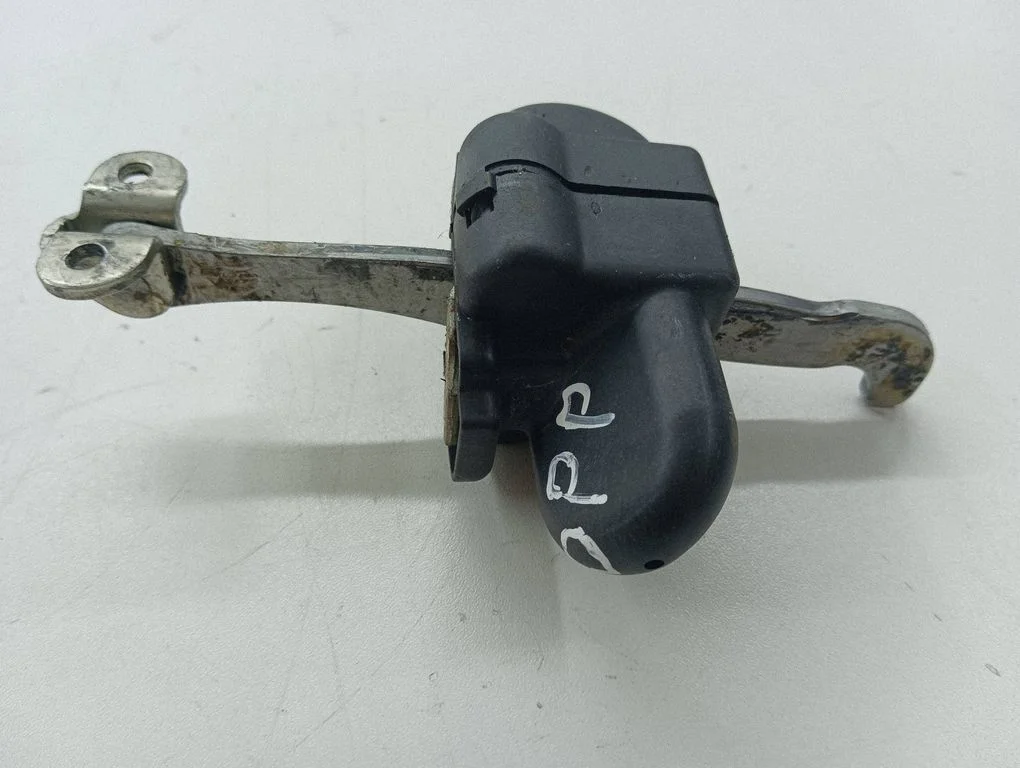 Front door check strap stopper – right
