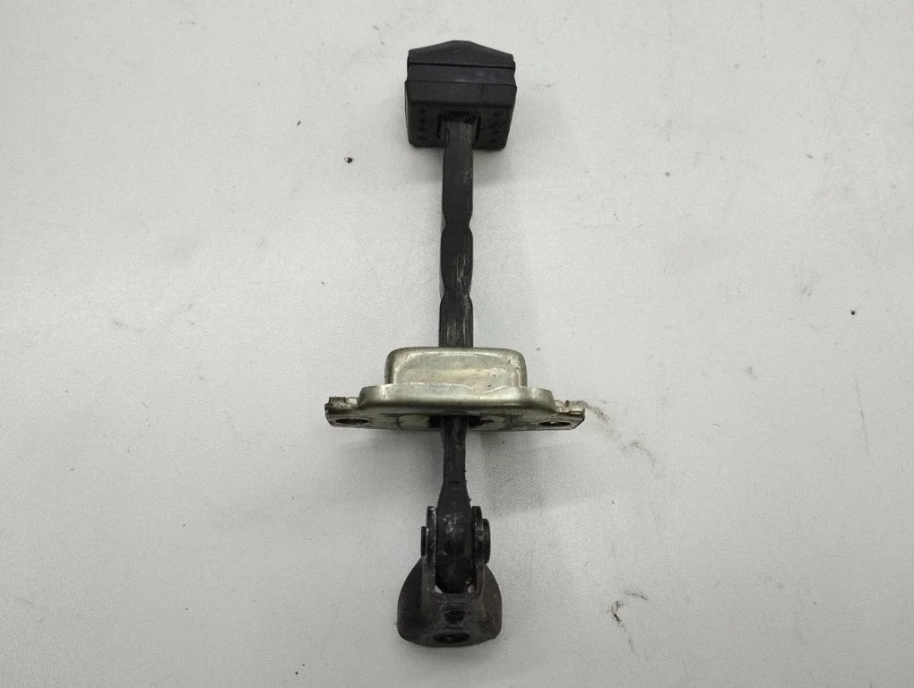Front door check strap stopper – right