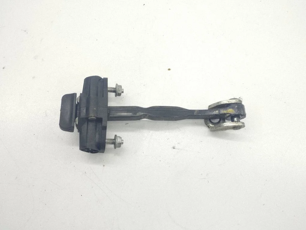 Front door check strap stopper – left