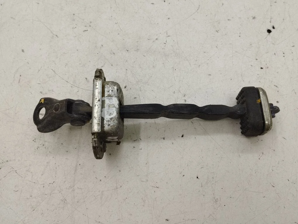 Front door check strap stopper – right