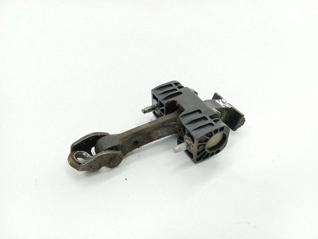 Front door check strap stopper – left