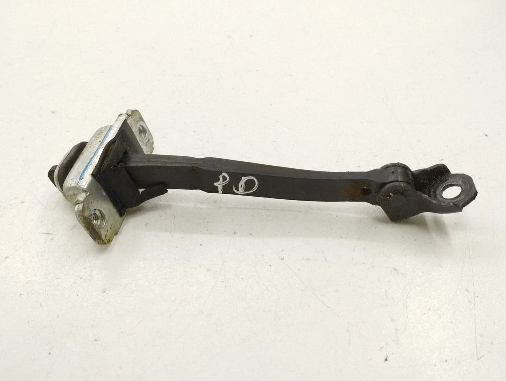 Front door check strap stopper – right