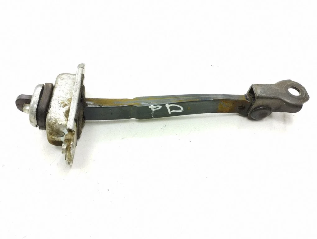 Front door check strap stopper – front right