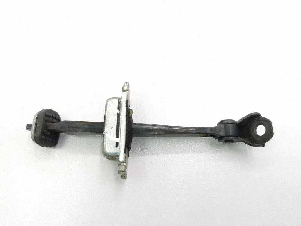 Front door check strap stopper – left