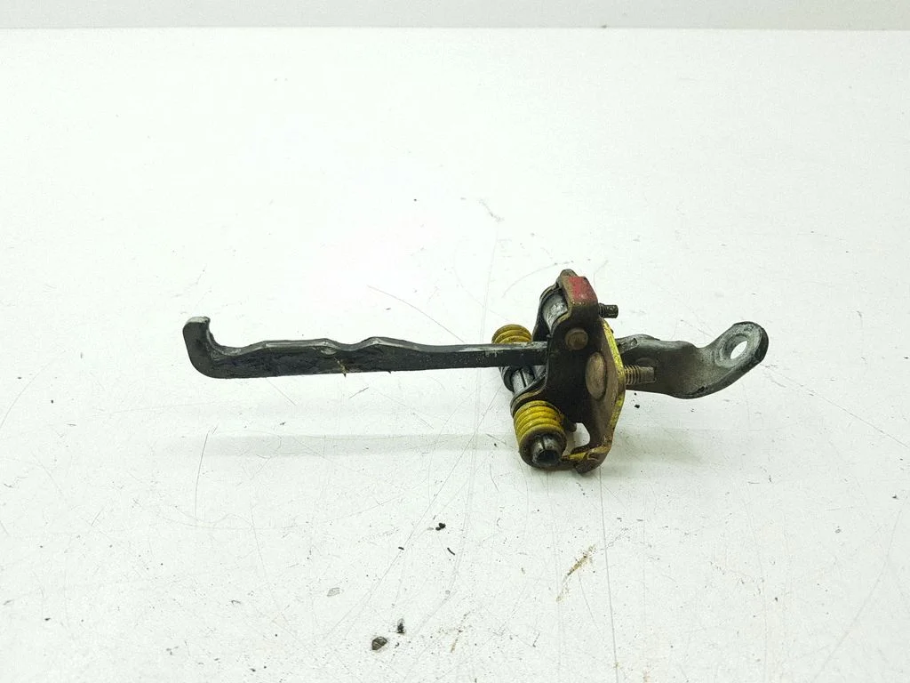 Front door check strap stopper – right