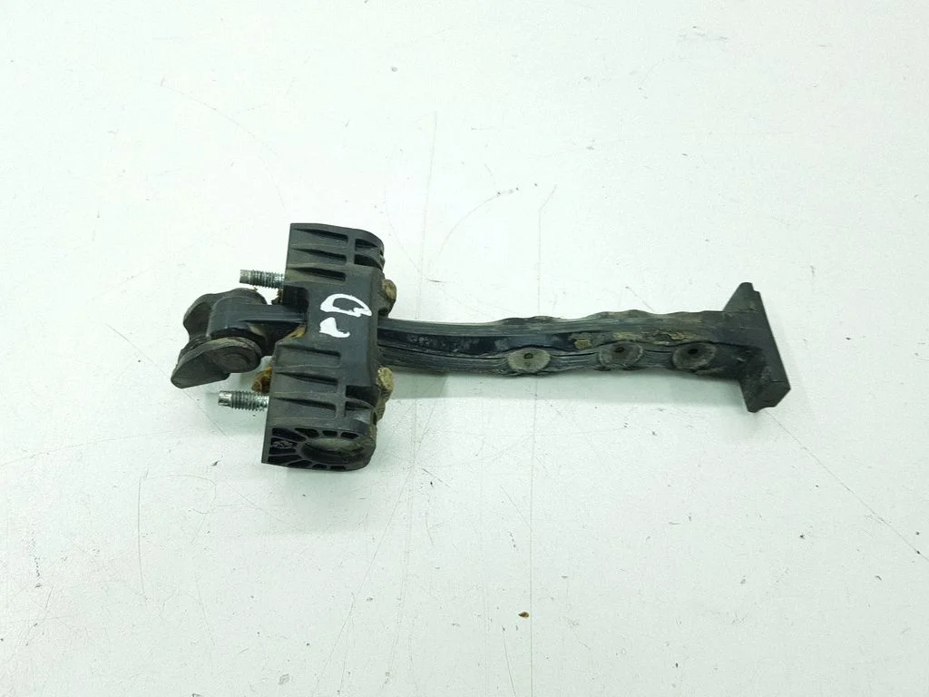 Front door check strap stopper – right
